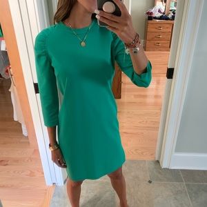 Green three quarter sleeve dress with side slits